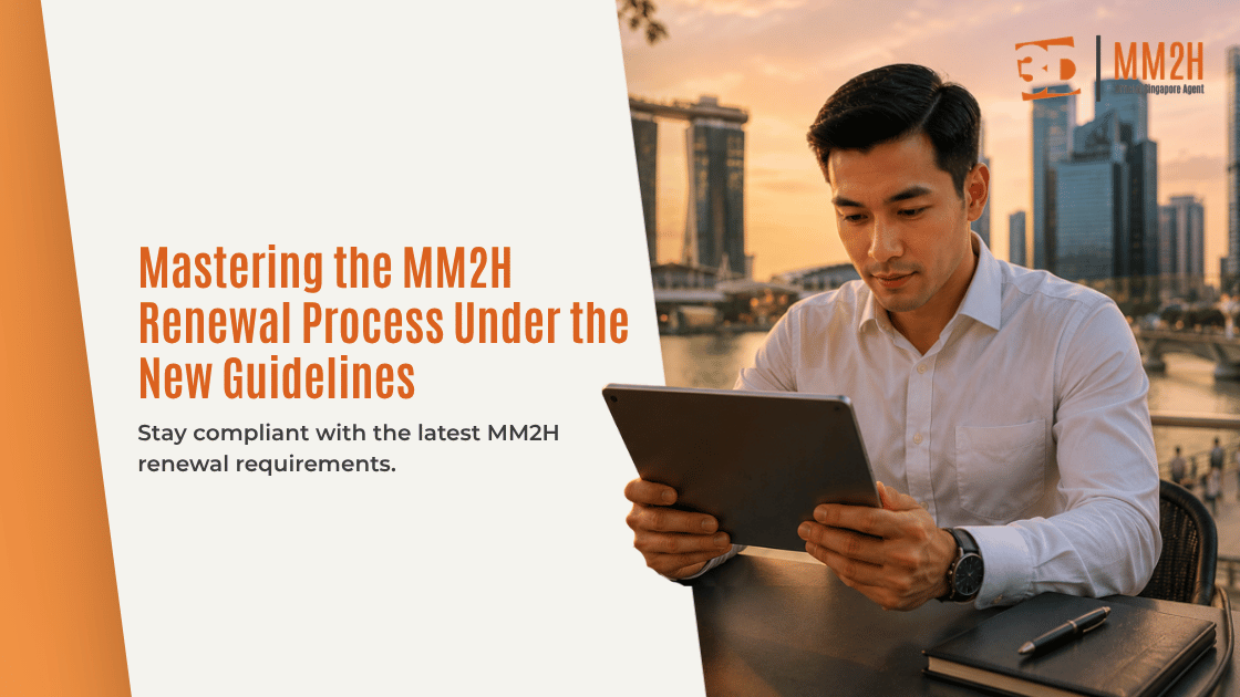An expatriate reviewing official immigration documents for the MM2H renewal process with a consultant.